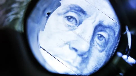 Detailed study of 100 dollar bills in a measuring glass Stock Footage 45293177