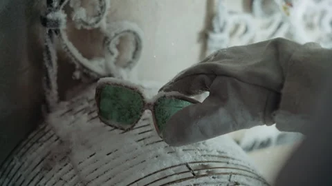 Detailed study of ice specimen. Precise inspection of cold sample in ruin Stock Footage 346471058