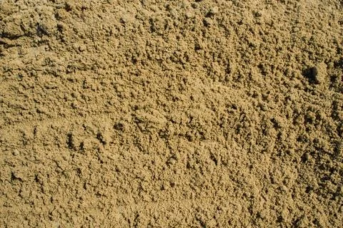 Detailed texture analysis sample showing damp compact sand with vertical ripp Stock Photos