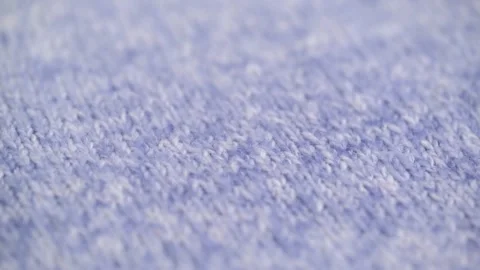 Detailed texture of light blue knitted wool fabric with fluffy pile. rotation. Stock Footage 250109446