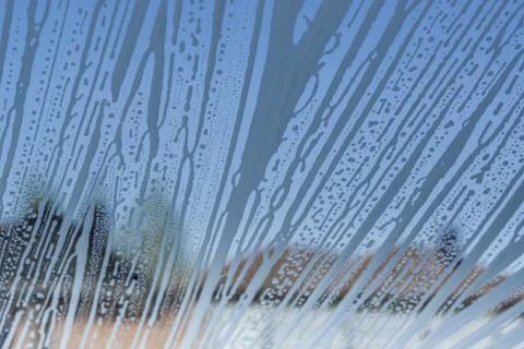 Detailed  texture. Soap foam pattern and bubbles on glass. Foto stock