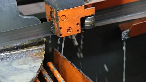 Detailed View of Bandsaw Blade Cutting Steel Profile Video stock 339242574