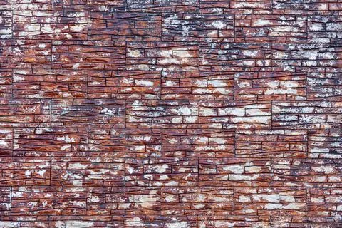 Detailed view of a brick wall. The bricks are arranged in a staggered patte. Stock Photos