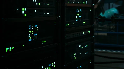 Detailed view of computer servers in a data center during nighttime Stock Footage 348558401