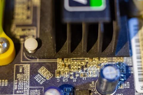 Detailed view of cooling system hardware integrated into a circuit board Stock Photos