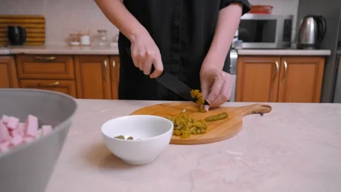 Detailed View Of Culinary Work Involving Chopping Ingredients On Wooden Board 動画素材 331148835