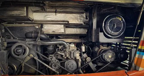 Detailed view of a double decker bus engine bay showing belts, pulleys, rad.. Stock Photos