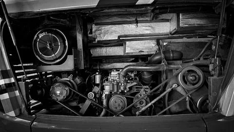 Detailed view of a double decker bus engine bay showing belts, pulleys, rad.. Stock Photos