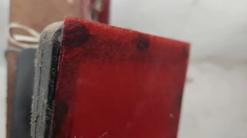 Detailed view of a dusty red motion sensor light outdoor Stock Footage 333776962