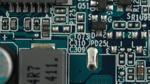 Detailed View of Electronic Circuit Board Components and Traces Stock Footage 337009422