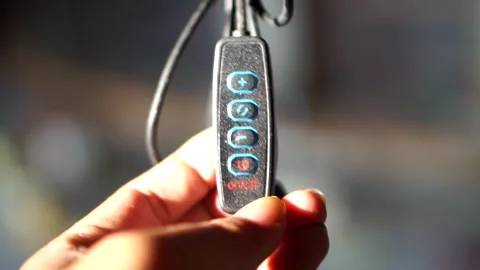 Detailed view of electronic device controller switch with light intensity Stock Footage 335896934