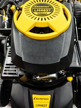 A detailed view of the engine compartment of the yellow and black Champion LM Stock Photos