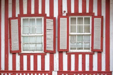 Detailed view of front facade windows of typical Costa Nova beach house Stock Photos