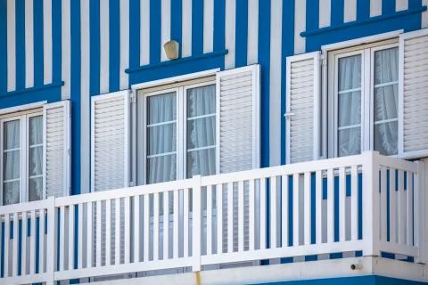 Detailed view of front facade windows and balcony of typical Costa Nova beach Stock Photos