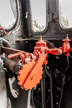 Detailed view of functioning valves in a steam locomotive cabin Stock Photos