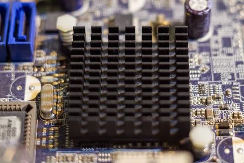 Detailed view of hardware cooling system installed on circuit board Stock Photos