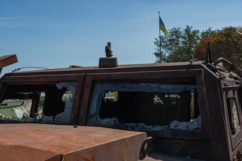 A detailed view of the interior of a war-torn car, with rust and decay taking Stock Photos