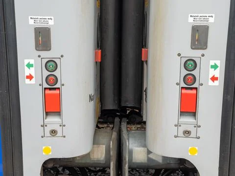 A detailed view of the Kamax train coupling mechanism with water level 스톡 사진