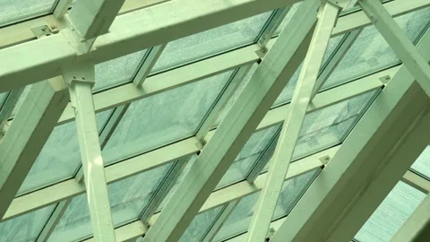 Detailed view of metal framework and glass skylight creates striking archit.. Stock Footage 348419683