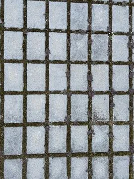 A detailed view of a metal mesh grid with square patterns Foto stock
