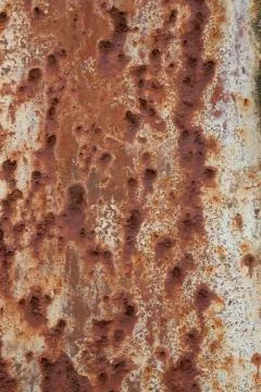 A detailed view of an old and rusting exterior metal surface Fotos de archivo