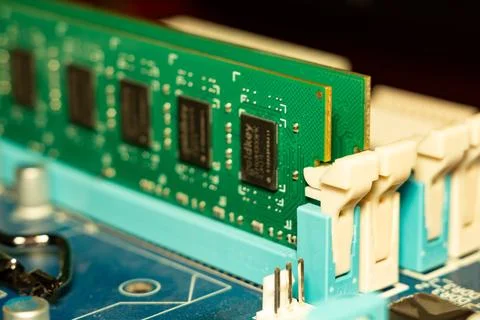 A detailed view of ram module installed in motherboard slot for computer 스톡 사진