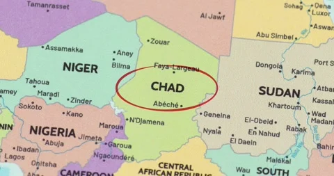 Detailed view of a red circle marking to chad on a modern political world map Видео 348178095