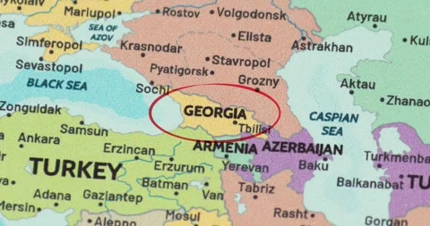 Detailed view of a red circle marking to georgia on a modern political world map Vídeo Stock 348178174