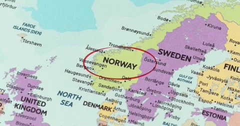 Detailed view of a red circle marking to norway on a modern political world map Видео 348178798