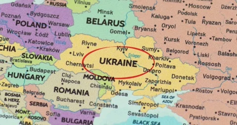 Detailed view of a red circle marking to ukraine on a modern political world map 動画素材 348178952
