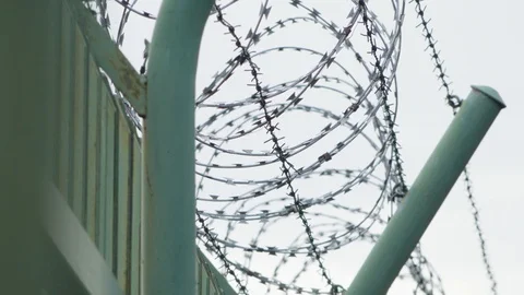 A detailed view of a sharp wire fence. Stock Footage 123651700