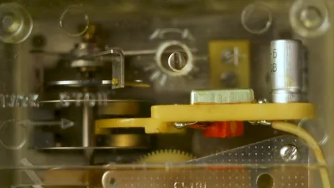 Detailed view of technical parts inside old machinery showing complex assembly Stock Footage 335541249