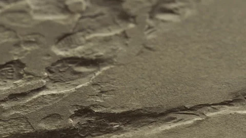Detailed view of texture on a surface with lines and grooves in sunlight Stock Footage 340984389