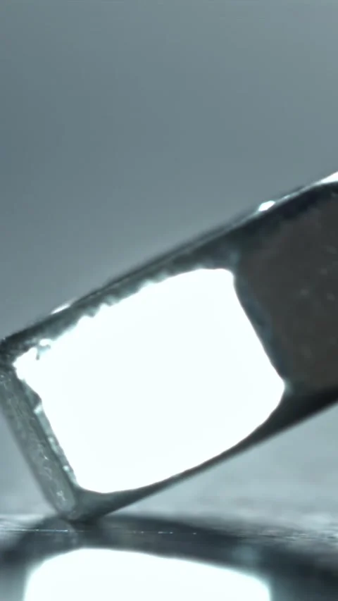 Detailed view of turning nut with reflective surface and highlights Filmed on a Stock Footage 335396268