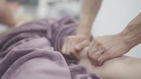Detailed Work on a Client's Back by Expert Masseur Stock Footage 263930796