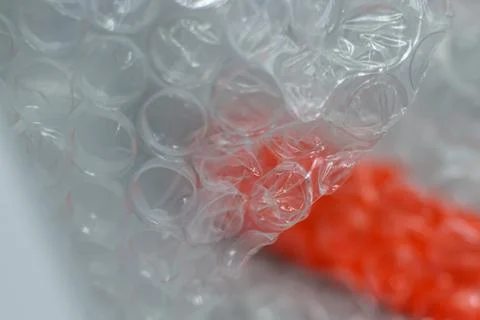 Detailes close up view on bubble wrap, transparent plastic packaging Stock Photos