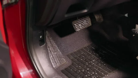 Detailing of a red car. Man cleaning car interior Stock Footage 209119595