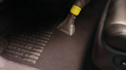 Detailing of a red car. Man cleaning car interior Stock Footage 209120089