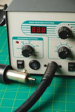 Detailing tools for precision electronic repairs in a workspace environment Stock Photos
