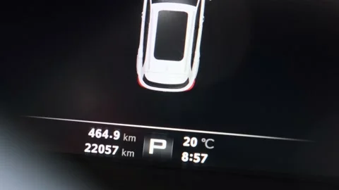 Details of the boot lid warning light open on the black dashboard in the car. Stock Footage 168046425
