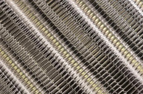 Details of the car engine radiator. Macro close-up of the radiator plates. Stock Photos