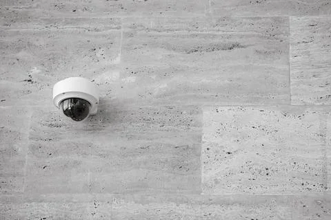 Details with a CCTV camera on a wall inside a building. Stock-Fotos