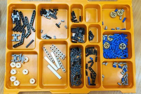 Details of the children's plastic constructor are laid out on the beds Stock-Fotos