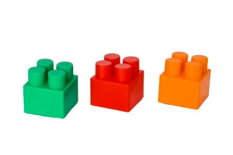 Details of a children's plastic constructor on a white background. colored cu Stock Photos