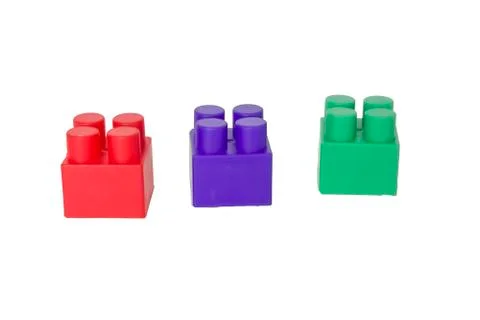 Details of a children's plastic constructor on a white background. colored cu Stock Photos