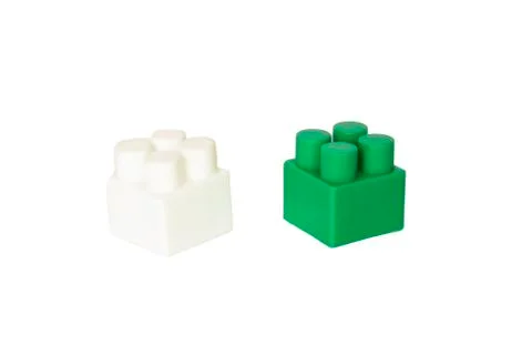 Details of a children's plastic constructor on a white background. colored cu Foto stock