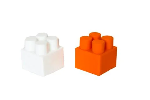 Details of a children's plastic constructor on a white background. colored cu Stock Photos