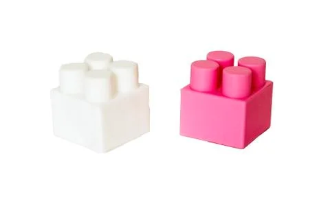 Details of a children's plastic constructor on a white background. colored cu Stock-Fotos