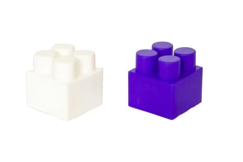 Details of a children's plastic constructor on a white background. colored cu Stock Photos