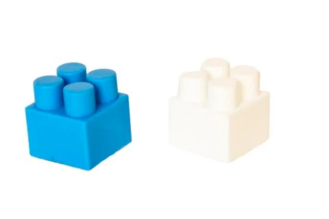 Details of a children's plastic constructor on a white background. colored cu Stock Photos